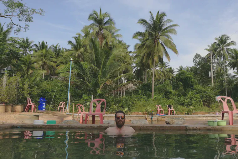 Soaking in the 40 °C waters of the hot spring in Palian, Thailand, as I prepared for the Krabi International Trail race.